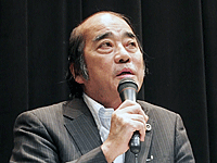 報告する田辺幸雄弁護士 報告する田辺幸雄弁護士